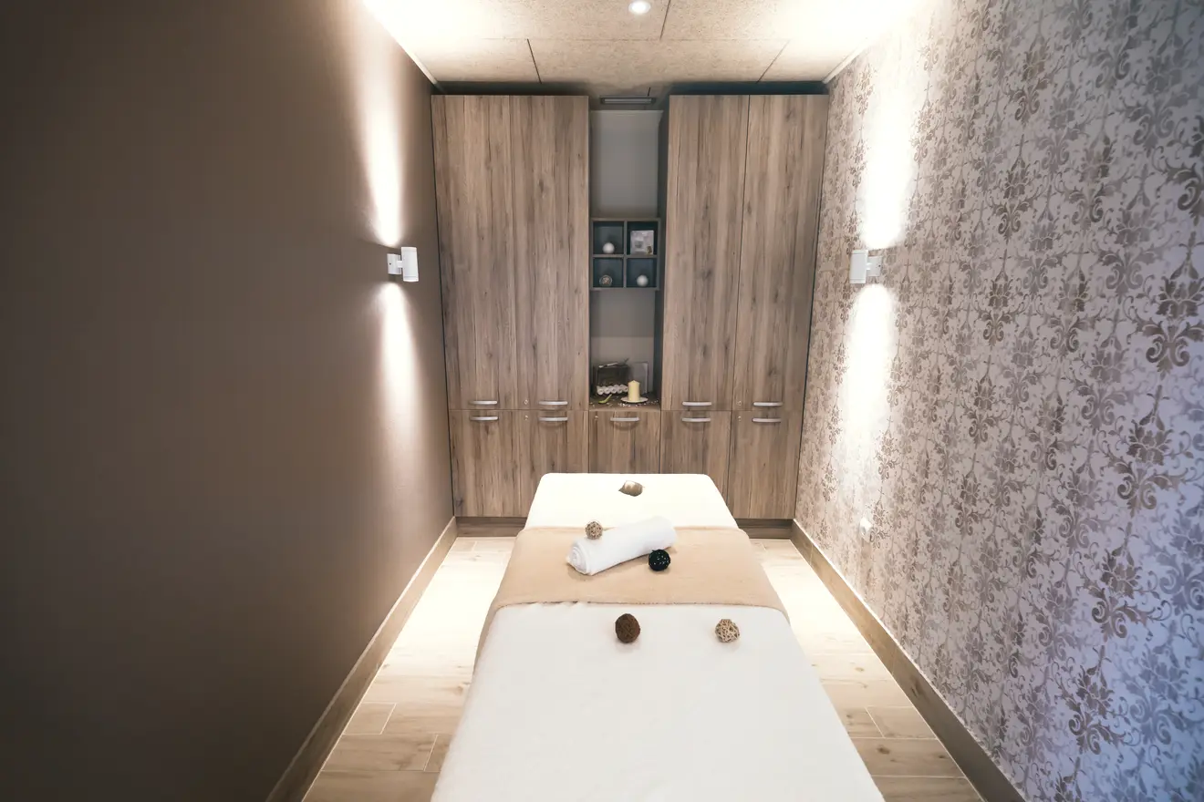Massage room with two treatment beds
